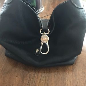 Need to sell moving hobo logo lock handbag